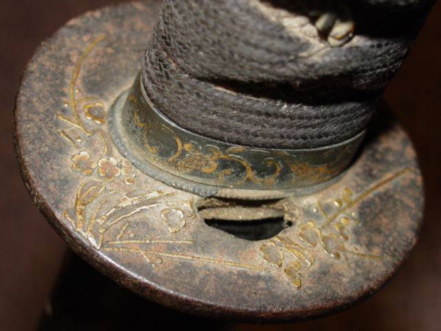 Gold leafing applied to Tsuba surface