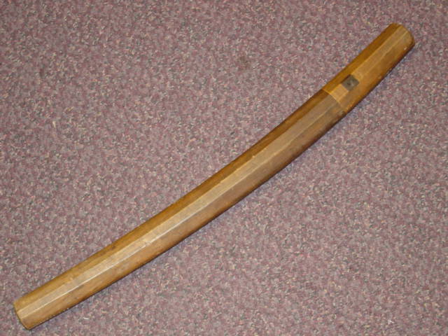 Wakisashi Samurai sword in wooden storage scabbard