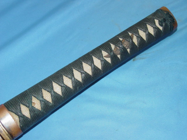 Militia sword handle with bird Menuki